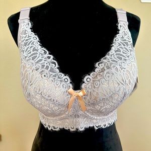 Three brand new bras with tags, never worn.